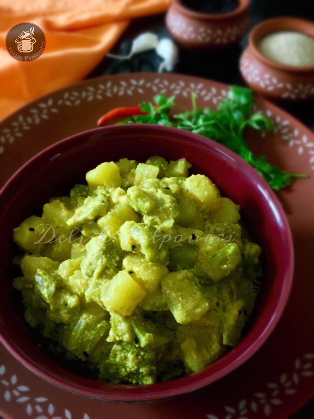 Janhi Aloo Posto….Ridge gourd and potatoes cooked with Poppy seed paste